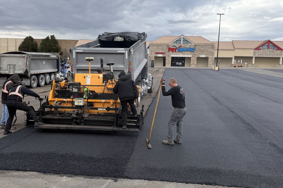 SealTek asphalt paving crew installing a new driveway in Findlay, Ohio