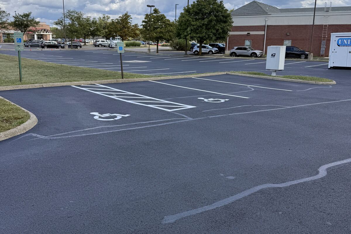 Commercial parking lot being sealcoated in Columbus, Ohio