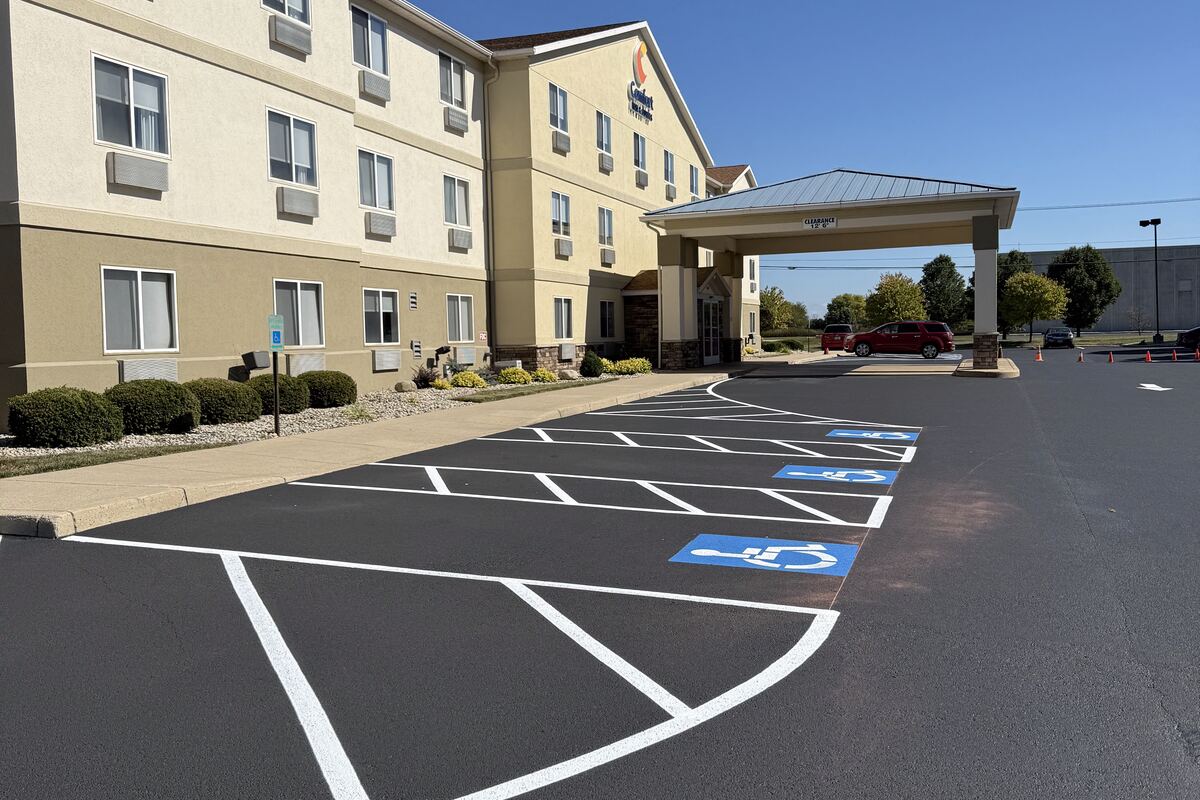 Retail plaza parking lot after sealcoating and line striping in Columbus, Ohio